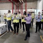 Pfizer Employees Clap After Line Workers Finished Packing Boxes Containing The Pfizer Biontech Covid 19 Vaccine To Be Shipped At The Pfizer Global Supply Kalamazoo Manufacturing Plant