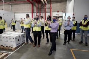 Pfizer Employees Clap After Line Workers Finished Packing Boxes Containing The Pfizer Biontech Covid 19 Vaccine To Be Shipped At The Pfizer Global Supply Kalamazoo Manufacturing Plant