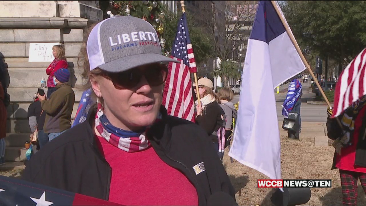 Trump supporters gather in the South Carolina State House to protest the election
