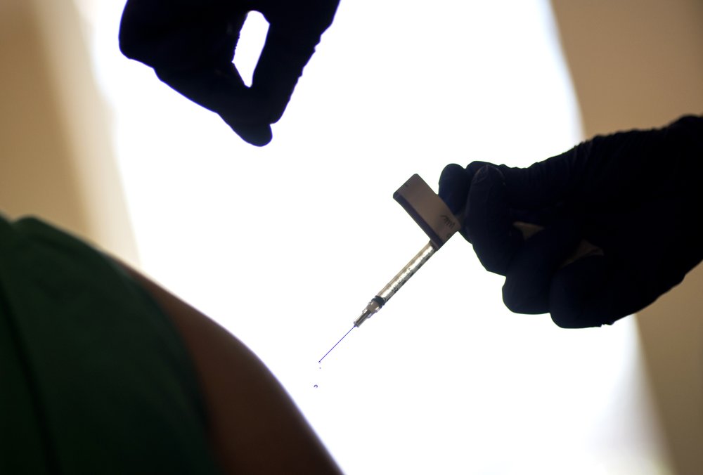 A Droplet Falls From A Syringe After A Health Care Worker Was Injected With The Pfizer Biontech Covid 19 Vaccine At Women & Infants Hospital In Providence, R.i., Tuesday, Dec. 15, 2020