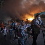 Migrants Flee From The Second Fire In Two Days At The Overcrowded Moria Refugee Camp On The Island Of Lesbos, Greece
