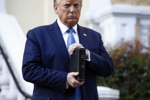 President Donald Trump Holds A Bible As He Stands Outside St. John's Church Across Lafayette Park From The White House In Washington On June 1, 2020
