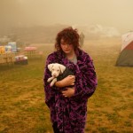 Shayanne Summers Holds Her Dog Toph While Wrapped In A Blanket On Sept. 13, 2020, After Staying Several Days In A Tent At An Evacuation Center At The Milwaukie Portland Elks Lodge In Oak Grove, Ore.