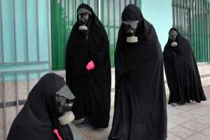 Women Clerics Wearing Protective Clothing And "chador," A Head To Toe Garment, Arrive At A Cemetery To Prepare The Body Of A Person Who Died From Covid 19 For A Funeral, In Ghaemshahr, Iran