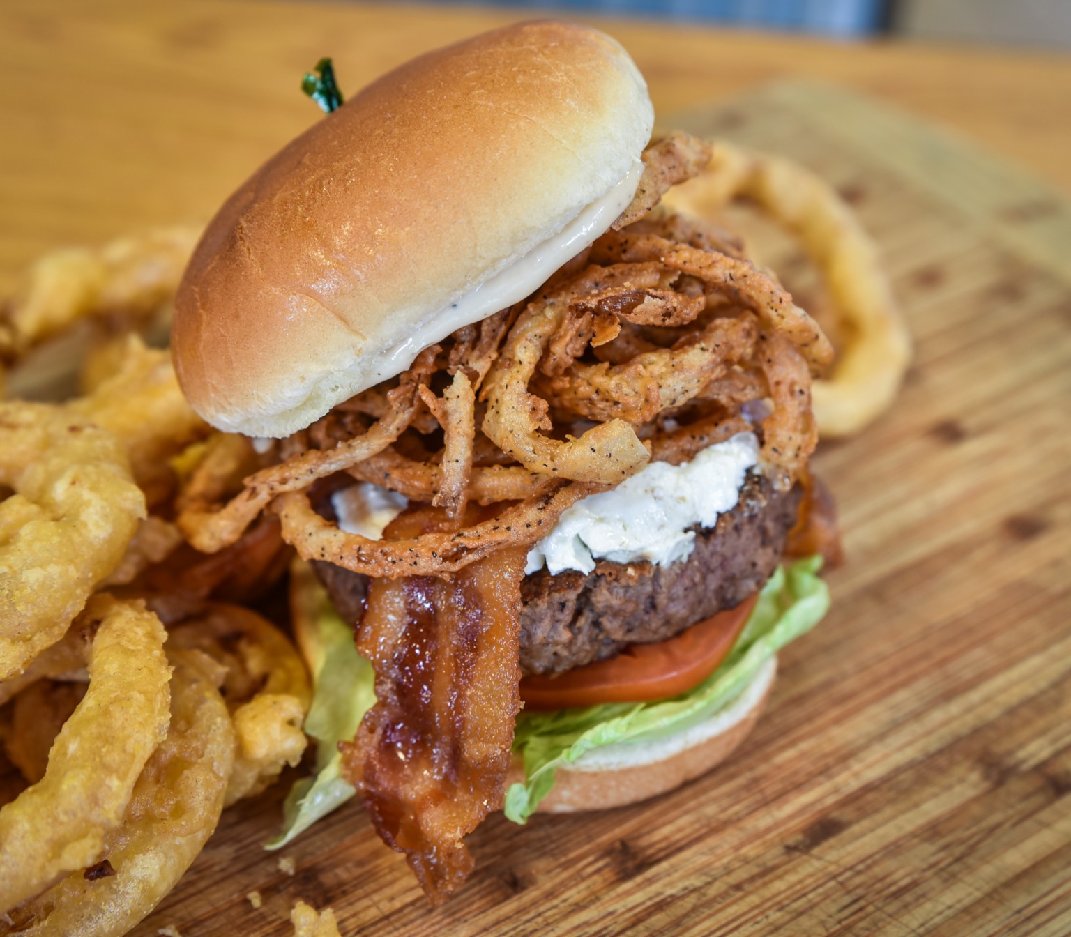 The Candied G.O.A.T. Burger From Johnny Rogers BBQ And Burgers In 