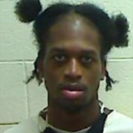 Old Mugshot Of Malek Moore