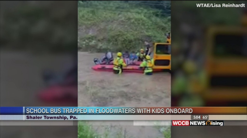 Bus Trapped In Floodwaters