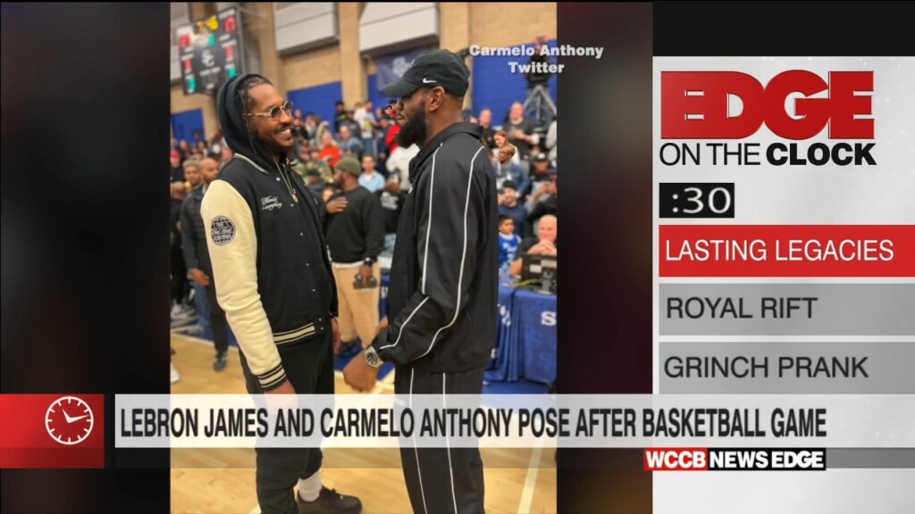 Edge On The Clock: Lebron & Carmelo Sit Next To Each Other To Watch Sons Play Basketball