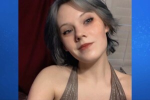 Syndey Mudic Blue Background