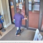 Simmons Entering Bank With Minion Lunchbox
