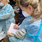 1 Carolina Raptor Center Director Of Avian Operations Kristin Dean Maintains Vaccination Records For Each Black Vulture