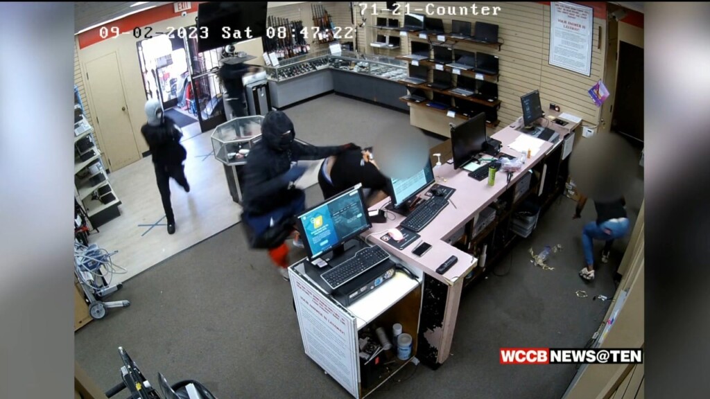 Surveillance Video Shows 3 Armed, Masked Men Rob Pawn Shop Of 26 Guns
