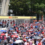Crowds gather outside Bojangles' Coliseum ahead of a rally for Donald Trump.
