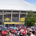 Crowds gather outside Bojangles' Coliseum ahead of a rally for Donald Trump.