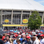 Crowds gather outside Bojangles' Coliseum ahead of a rally for Donald Trump.
