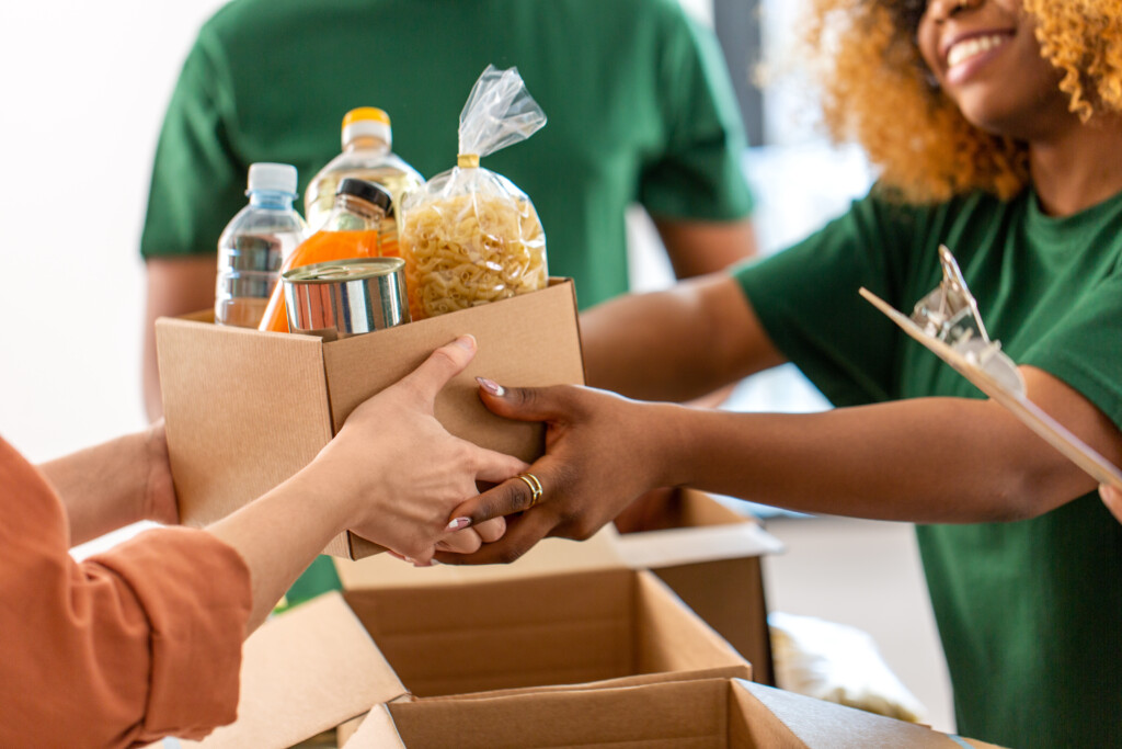 Volunteers Give Food At Refugee Assistance Center
