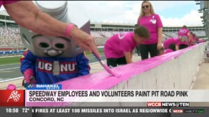 The Community Comes Together To Paint The Wall Pink At Charlotte Motor Speedway