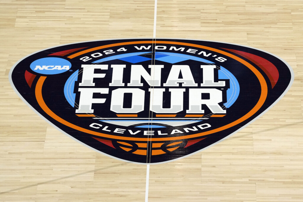 FILE - A person spins a basketball on their finger during South Carolina's practice for the NCAA Women's Final Four championship basketball game Saturday, April 6, 2024, in Cleveland. (AP Photo/Carolyn Kaster, File)