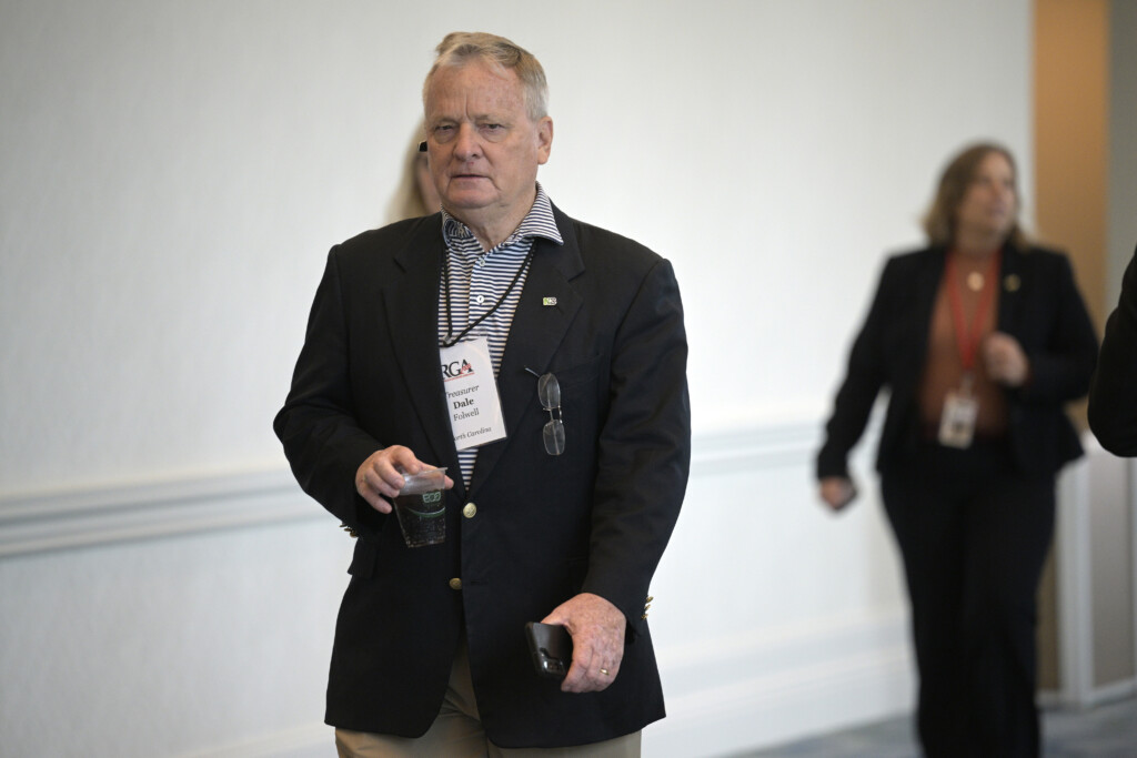 North Carolina State Treasurer Dale Folwell walks through the Republican Governors Association conference, Nov. 16, 2022, in Orlando, Florida. (AP Photo/Phelan M. Ebenhack, File)