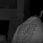 A picture from a surveillance camera shows a man wanted for a burglary at a home in Monroe.