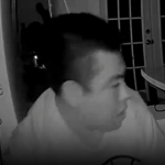 A picture from a surveillance camera shows a man wanted for a burglary at a home in Monroe.