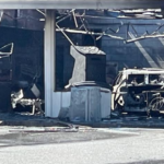 One person died after a car crashed into a Statesville laundromat, sparking a fire on Thursday.