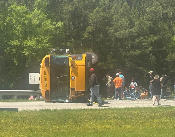 A school bus from Lexington District 2 overturned on I-77 in Chester Co. during a field trip. Photo from Melvin Young.