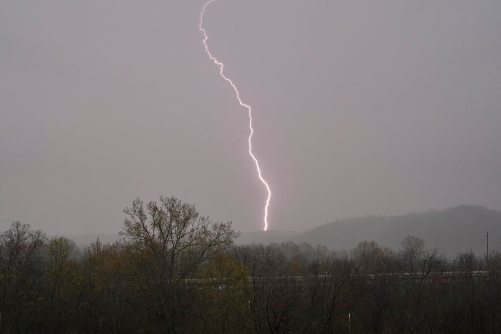 Lightning strikes as storms move through the area Wednesday, April 2, 2025, in Ashland City, Tenn. (AP Photo/George Walker IV)