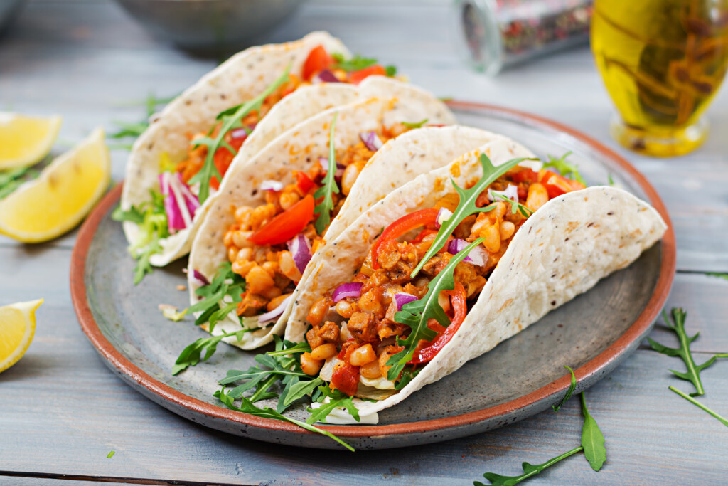 Mexican Tacos With Beef, Beans In Tomato Sauce And Salsa