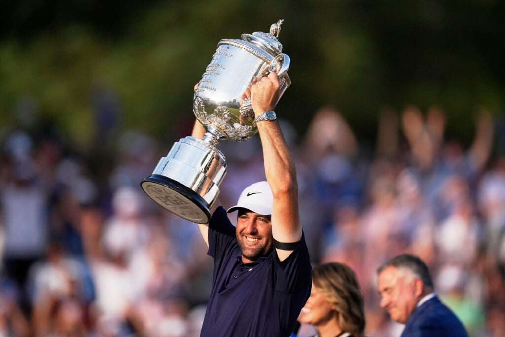 Scottie Scheffler holds the Wanamaker trophy after winning the PGA Championship golf tournament at the Quail Hollow Club, Sunday, May 18, 2025, in Charlotte, N.C. (AP Photo/George Walker IV)