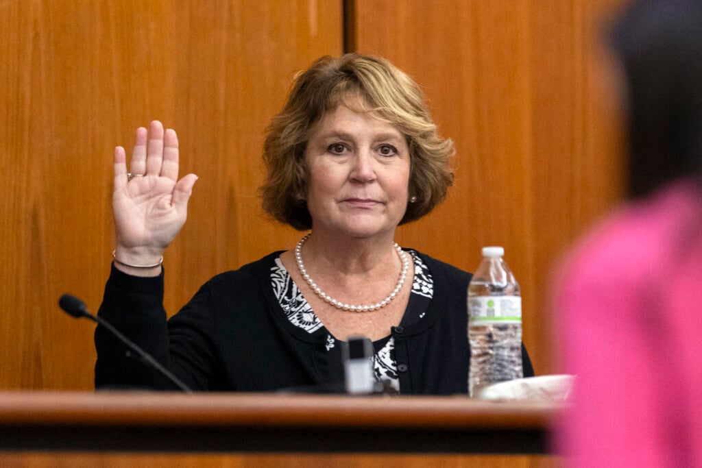 Colleton County Clerk of Court Rebecca Hill is sworn in before taking the stand to testify during the Alex Murdaugh jury-tampering hearing at the Richland County Judicial Center, Monday, Jan. 29, 2024, in Columbia, S.C. Hill, under investigation amid allegations of tampering with the jury in the Alex Murdaugh trial, announced her resignation on Monday, March 25, 2024. (Andrew J. Whitaker/The Post And Courier via AP, Pool, File)