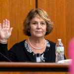 Colleton County Clerk of Court Rebecca Hill is sworn in before taking the stand to testify during the Alex Murdaugh jury-tampering hearing at the Richland County Judicial Center, Monday, Jan. 29, 2024, in Columbia, S.C. Hill, under investigation amid allegations of tampering with the jury in the Alex Murdaugh trial, announced her resignation on Monday, March 25, 2024. (Andrew J. Whitaker/The Post And Courier via AP, Pool, File)