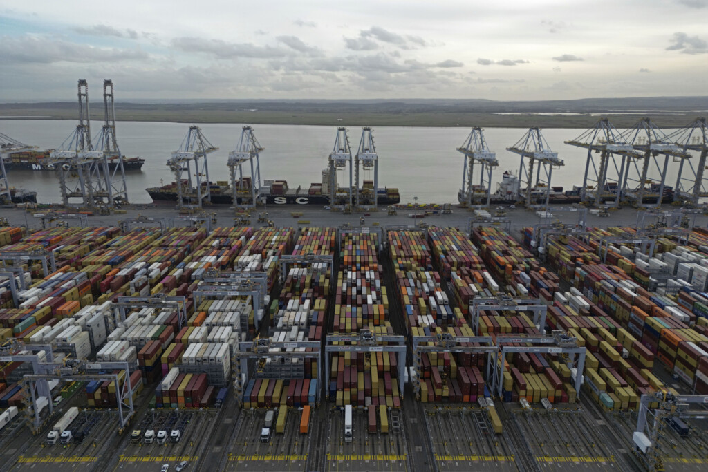 Shipping containers wait to be processed at London Gateway port, in Stanford-le-Hope, on the Thames estuary east of London, England, Wednesday, Feb. 5, 2025. (AP Photo, File)