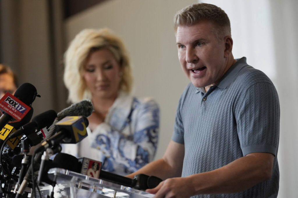Reality television star Todd Chrisley, speaks as his daughter Savannah Chrisley listens during a news conference on Friday, May 30, 2025 in Nashville, Tenn. (AP Photo/George Walker IV)