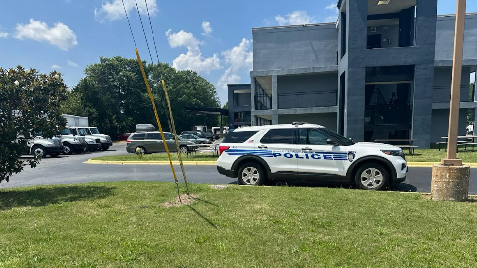 Police say a woman and a baby were found dead inside a room at a north Charlotte motel on Friday.