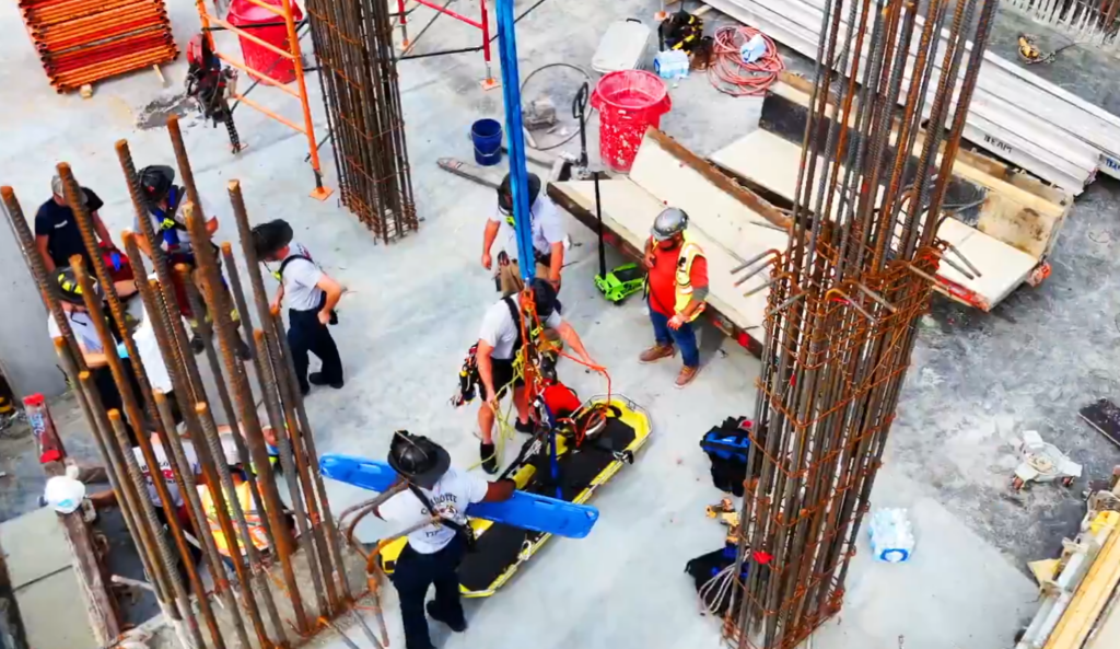 Charlotte Fire used a crane to help with the high-angle rescue of a construction worker Thursday. Pic from @CharlotteFD.