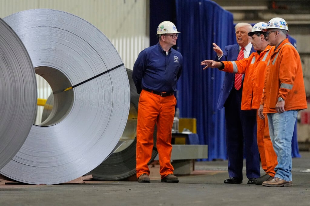 President Donald Trump talks to workers as he tours U.S. Steel Corporation's Mon Valley Works-Irvin plant, Friday, May 30, 2025, in West Mifflin, Pa. (AP Photo/Julia Demaree Nikhinson)