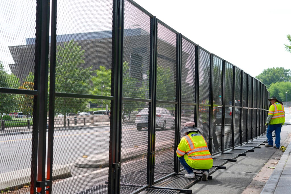 Security fencing is installed around the National Museum of African American History and Culture on the National Mall during security preparation for a festival and parade to commemorate 250th Birthday of the U.S. Army, Tuesday, June 10, 2025, in Washington. (Pablo Martinez Monsivais)