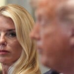 Attorney General Pam Bondi, left, listens as President Donald Trump