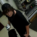 Lenoir Police are looking for a man accused of sexually assaulting a clerk during a convenience store robbery.
