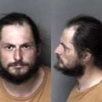 Michael Baker Parole Warrant