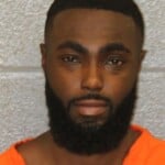 Aaron Osei Carrying Concealed Weapon Open Container
