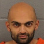 Niraj Patel Resisting Officer Carrying Concealed Weapon