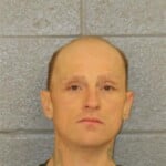 Michael Garrison Uttering A Forged Instrument