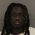 Cheikouna Mbacke Carry Concealed Weapon Gun Resist Public Officer