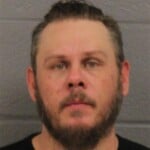 Michael Russell Assault And Battery Speeding Discharge Weapon Occupied Property