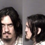 Travis Norton Resist Public Officer Trespass 2nd Degree Possess Drug Paraphernalia