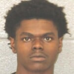 Davion Jones Discharging Firearm Into Occupied Property Possess Firearm By Felon