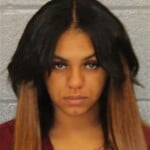 Anisha Clark Carrying Concealed Weapon Gun Conspiracy Shoplifting Concealment Goods