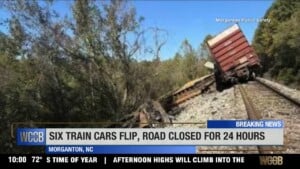 Six Train Cars Flip, Roadway Blocked For Hours